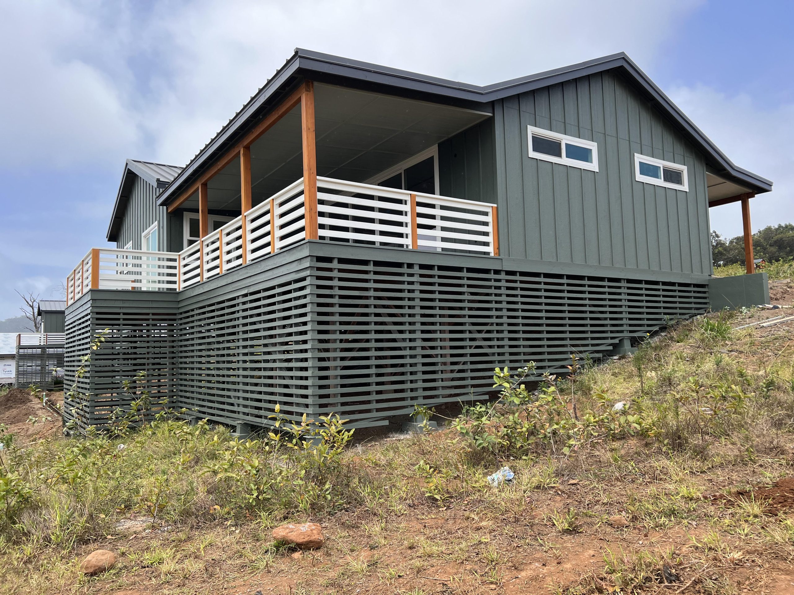 Maui painting team transforming a residential home exterior