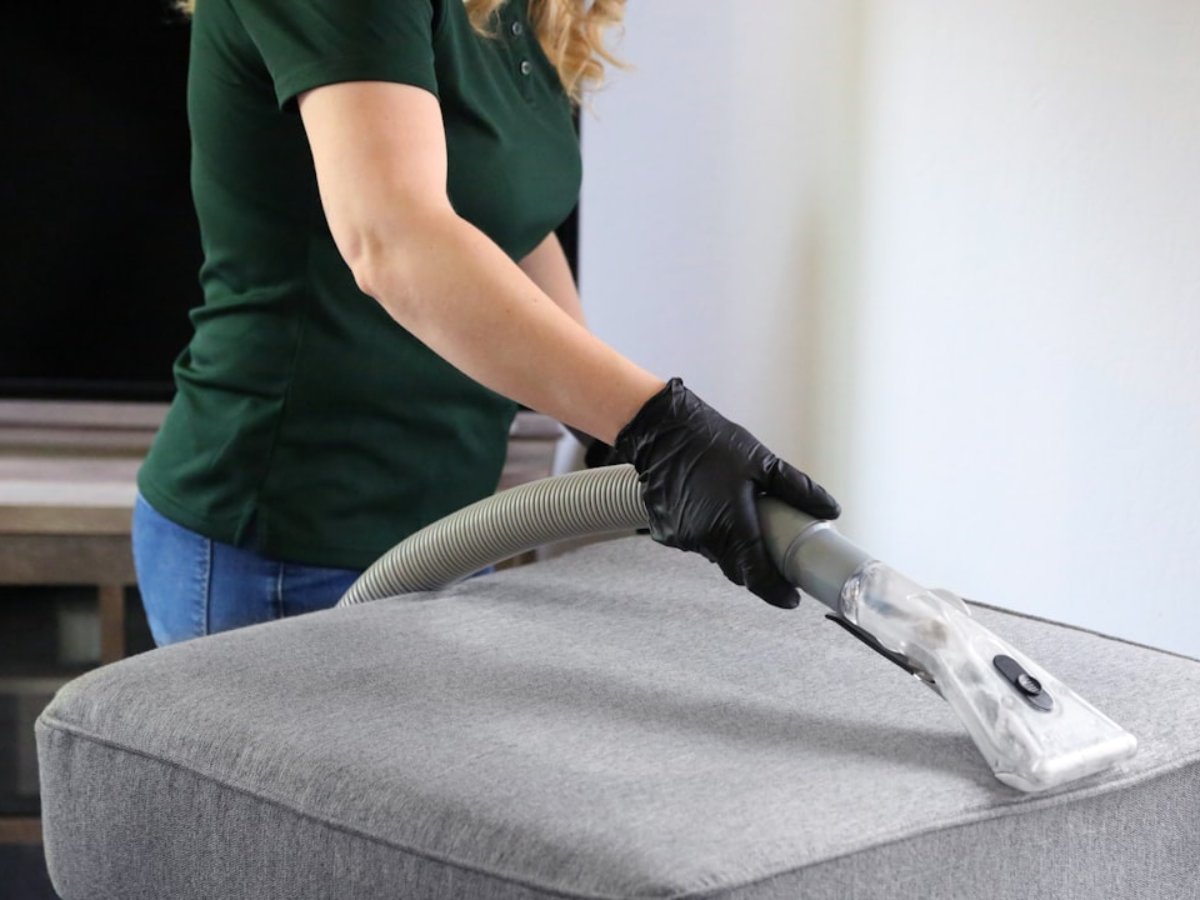 Team of cleaners with equipment ready for action