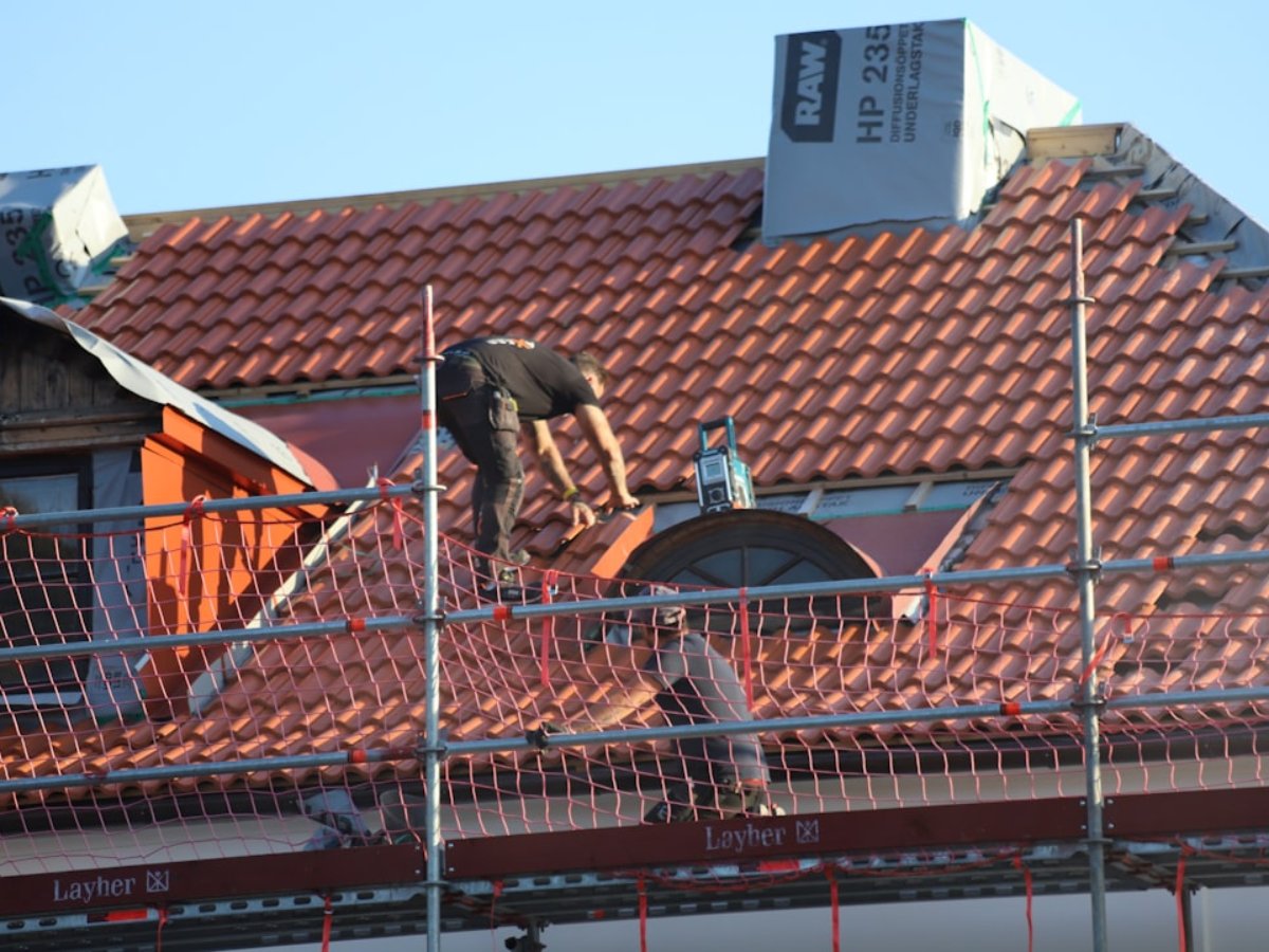 Team of roofers at work